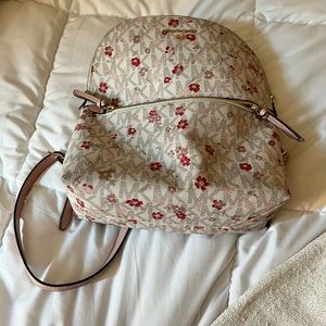 Pink Cute MK backpack.